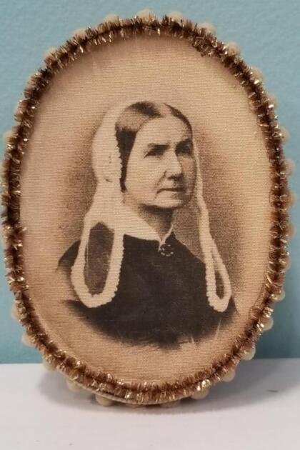 Stoic Colonial Woman with Long Loopy Bonnet Decorative Box